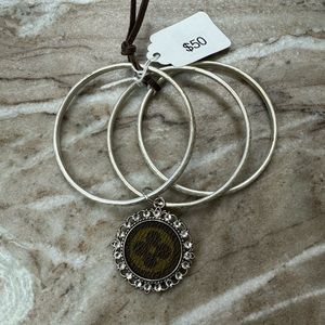 Set of 3 Silver Bangle Bracelets; one with lookalike Louis Vuitton logo charm